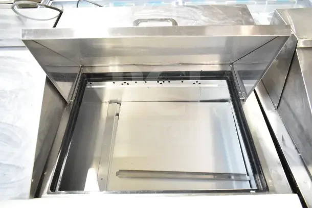2018 True TSSU-72-30MB-ST-HC commercial sandwich salad prep table; stainless steel, mega top, commercial casters, excellent condition.