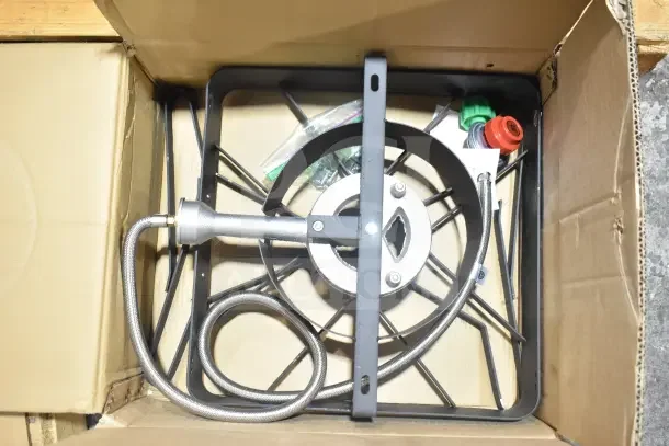 BRAND NEW CooKamp SA1100 High Pressure Gas Cooker in box. Includes metal burner, hose, and regulator. Minor box wear.