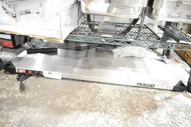 Brand new Metro Super Erecta HS1442 stainless steel heated shelf, 14"x42", 120V, 1 phase, slight scratches, tags visible.