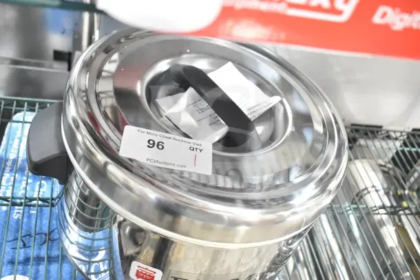 BRAND NEW RiceMaster Town 56912S 64 Cup Sushi Rice Container, stainless steel finish, with minor scratches. Auction label visible.
