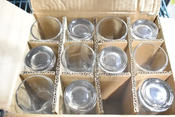 Box of 12 Acopa Straight Up 7 oz. Highball Glasses, brand new with minor scratches and dents.