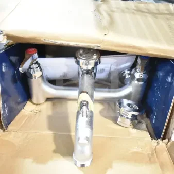 BRAND NEW T&S B-0665-BSTP Service Sink Faucet with built-in stops, vacuum breaker, and lever handles, in original box.