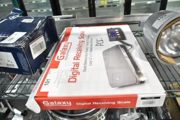 Brand new Avantco 177RS110LP Galaxy RS110LP 110 lb. digital receiving scale box with remote display, minor scratches visible.