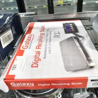 Brand new Avantco 177RS110LP Galaxy RS110LP 110 lb. digital receiving scale box with remote display, minor scratches visible.