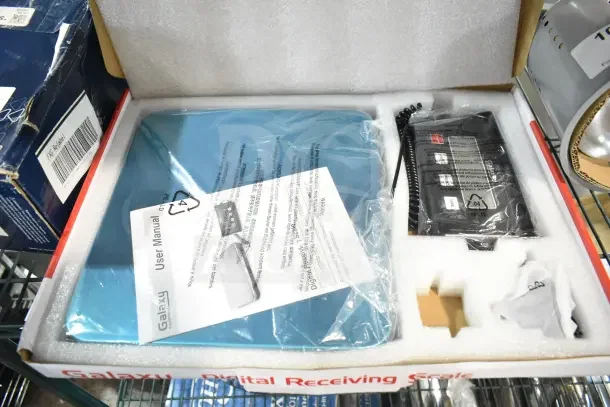 Brand new Avantco Galaxy RS110LP 110 lb. digital receiving scale with remote display, in original packaging, includes user manual.