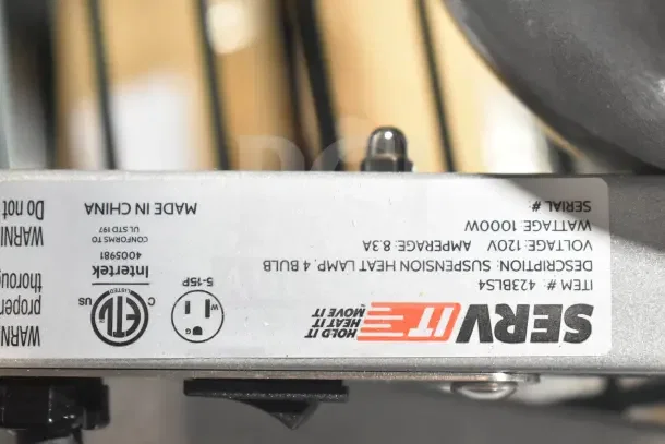 Brand new ServIt 423BLS4 4-bulb heat lamp. Scratch and dent condition. 120V, label indicates make and electrical specs.