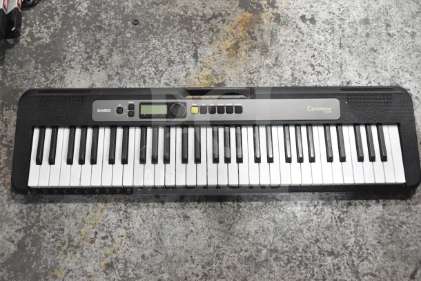 Seven keyboards including Rock Jam RJ640 and Casiotone LK-S250. Good condition, visible control panel, slightly worn keys.