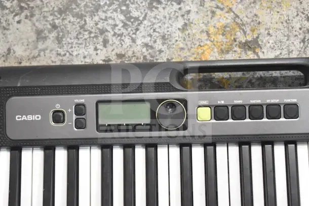 Seven keyboards including Rock Jam RJ640 and Casiotone LK-S250; keys and controls visible, in used condition.