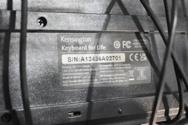 Seven Kensington keyboards with "Keyboard for Life" label, serial number A12436A02701. Made in China, 5V, 50mA rating.