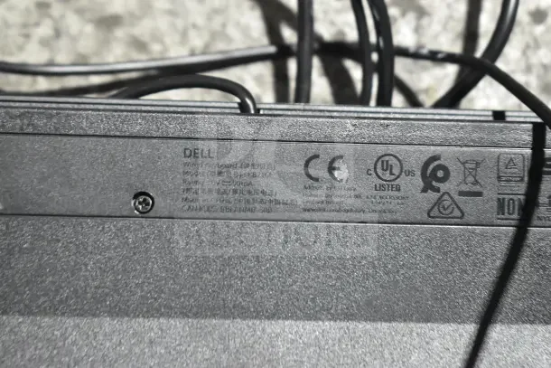Seven Dell computer keyboards with visible manufacturer info and certifications. Various models and conditions.