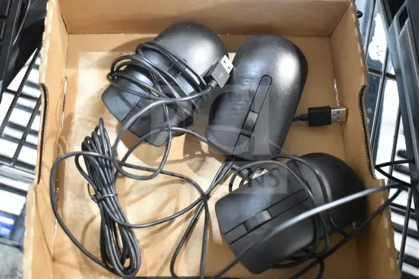 Cardboard box with multiple black wired computer mice, USB connectors visible. Items appear gently used.