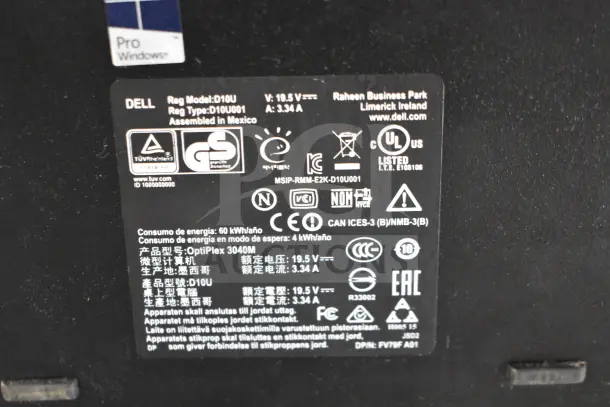"Label on Dell OptiPlex 3040M showing model D10U, voltage 19.5V, 3.34A. Assembled in Mexico, various certifications."