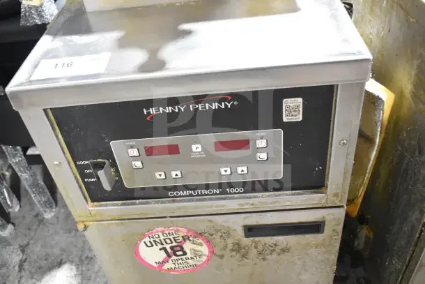 Henny Penny 600 commercial gas pressure fryer, 80,000 BTU, on casters. Visible controls and age wear, model Computron 1000.