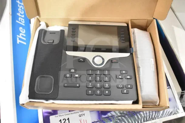 Brand new office telephone, corded, in original packaging, has minor scratches and dents, complete with keypad and display.