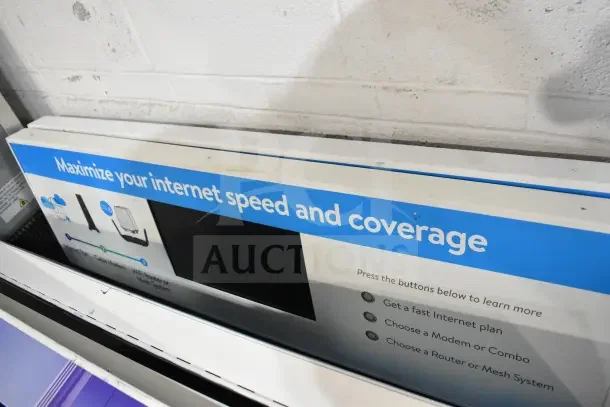 Netgear display promoting internet speed and coverage; features interactive buttons for info on plans and hardware.