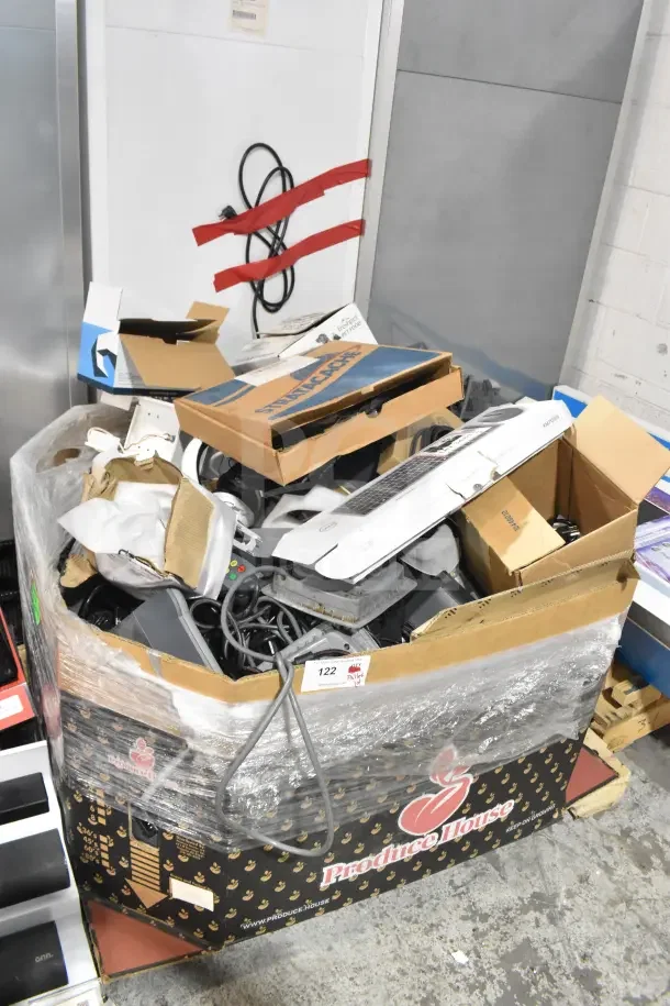 Pallet lot of assorted items including computer keyboard, Sensormatic ZBSMPROE, various electronics, in mixed condition.