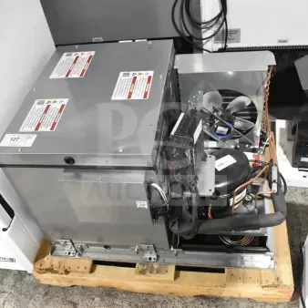 Brand new 2026 True REFDECK-M-2 commercial condensing unit for cooler, 208-240V, 1 phase, with minor scratches and dents.