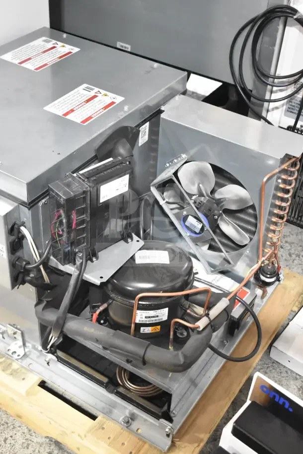 True REFDECK-M-2 commercial condensing unit, 208-240V, 1 phase. Brand new, slight scratches and dents, intact labels.