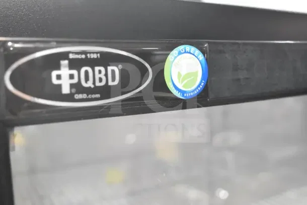 2017 QBD CD10-HC commercial cooler, single door, hydrocarbon refrigerant, 115 volts, with "Go Green" label.