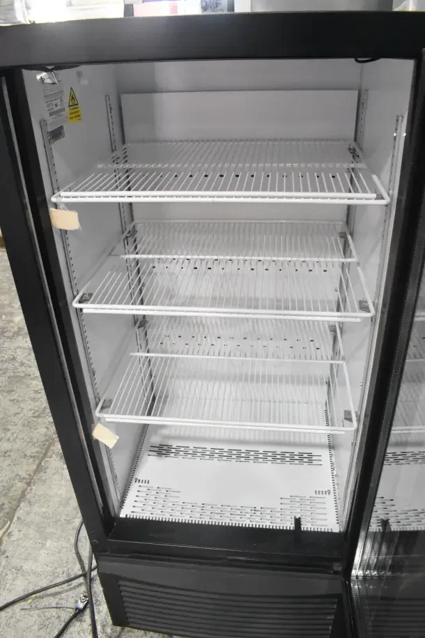 2017 QBD CD10-HC commercial single door reach-in cooler with adjustable wire shelves. Powered by 115 volts, 1 phase.