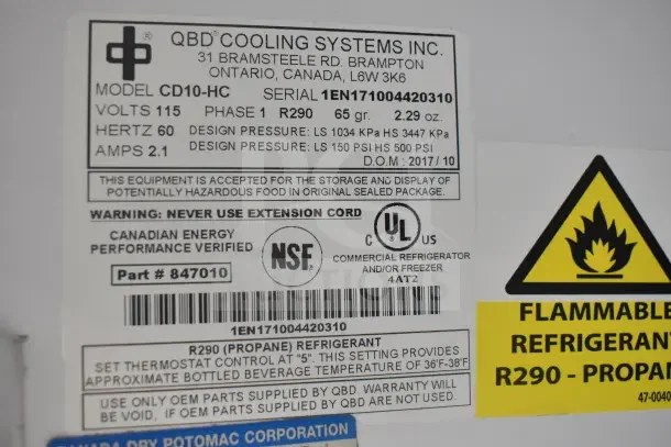 2017 QBD CD10-HC Commercial Cooler label with model, voltage, refrigerant type, and safety warnings visible. NSF certified.