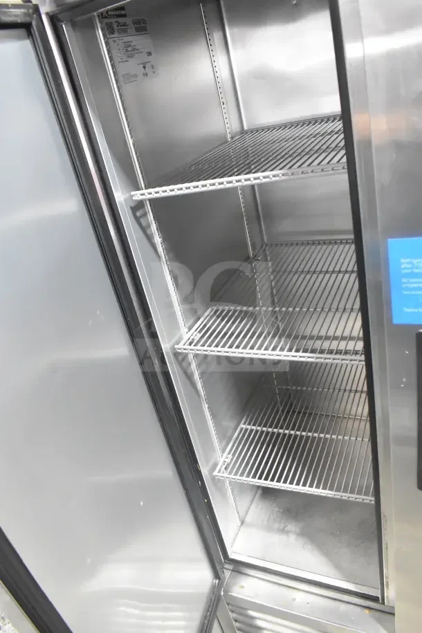 2018 True T-35-HC Commercial 2 Door Cooler with shelves, on casters. Model tag visible. 115V, 1 Phase.