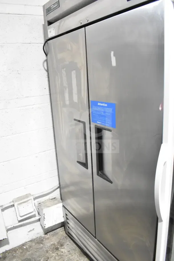 2018 True T-35-HC Commercial 2 Door Reach-In Cooler, 115V, 1 Phase, stainless steel, with handle, in used condition.