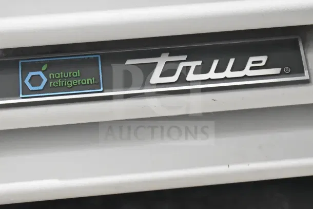 True logo with "natural refrigerant" label on a 2021 T-35 commercial cooler merchandiser.