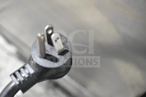 Close-up of a 115V power plug for a 2018 True T-19F-HC commercial freezer.