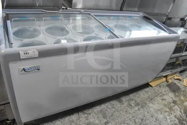 Brand new Avantco commercial chest freezer merchandiser, 115V, 1 phase, with minor scratches and dents, visible model label.