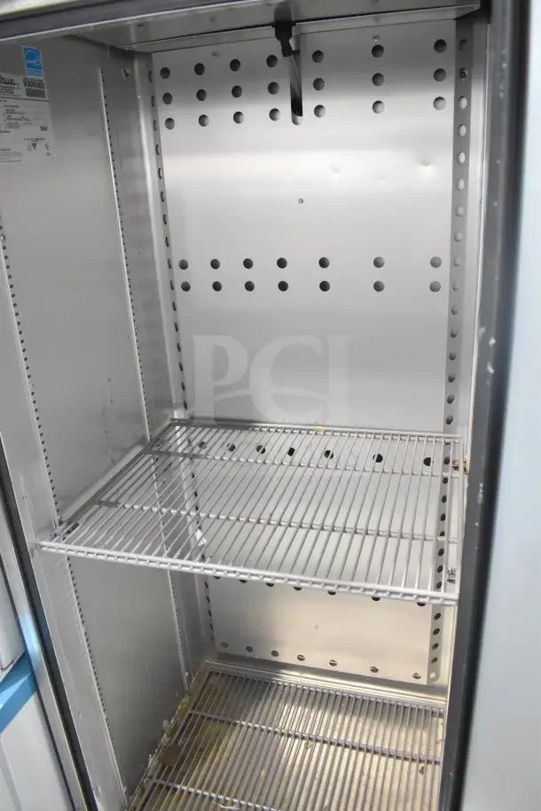 2018 True T-19F-HC single door reach-in freezer, stainless interior, commercial casters, 115V, tags intact, good condition.