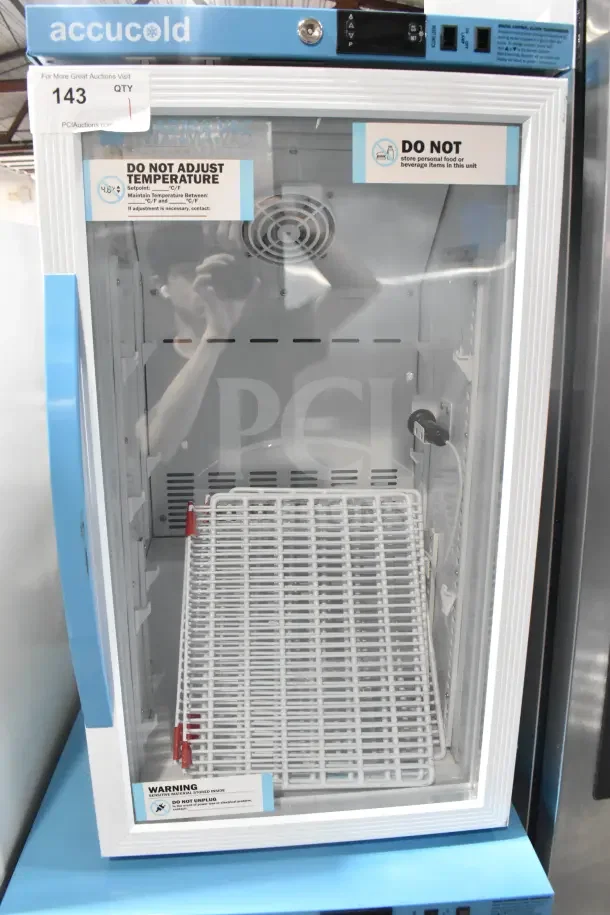 Accucold ARG3PV Mini Cooler Merchandiser, 110 Volts, clear door, fan, shelving, warning labels visible, excellent condition.