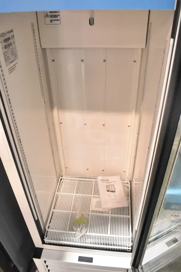 2022 Accucold ACR82L Reach-In Cooler, single door, 110 volts, with manual inside. Like-new condition, features adjustable shelves.