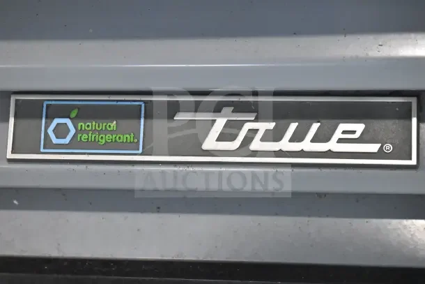 2017 True GDM-12-HC-LD cooler label showing "natural refrigerant" and "True" branding.