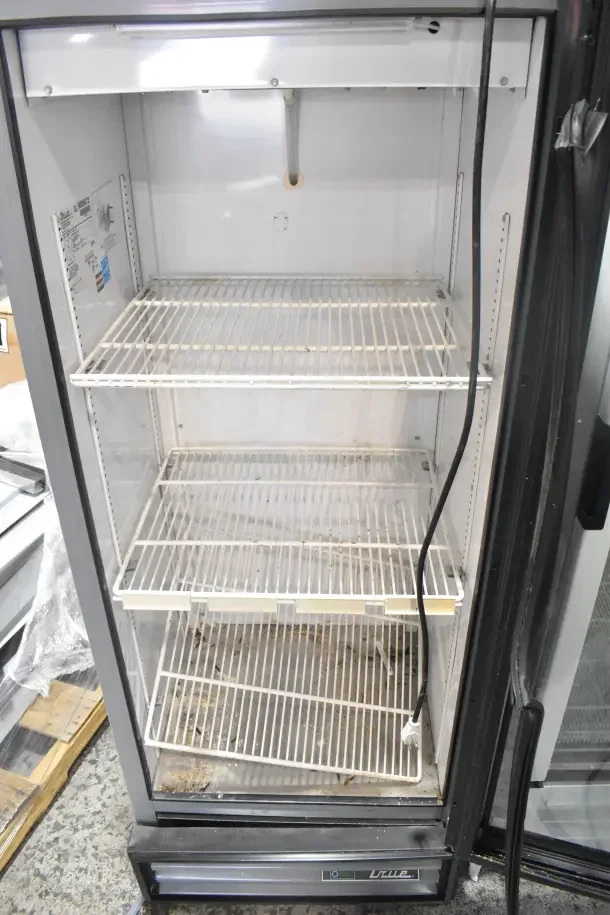 2017 True GDM-12-HC-LD single door reach-in cooler, 115 volts, 1 phase, features adjustable wire shelves, visible internal thermometer.