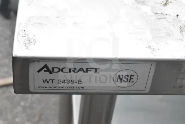 Adcraft commercial table model WT-2436-E with under shelf, NSF certified, visible label indicating brand and model.