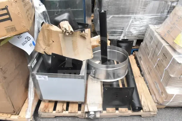 12 brand new scratch and dent items including metal table base pieces and ice bin. Pallet with mixed components.