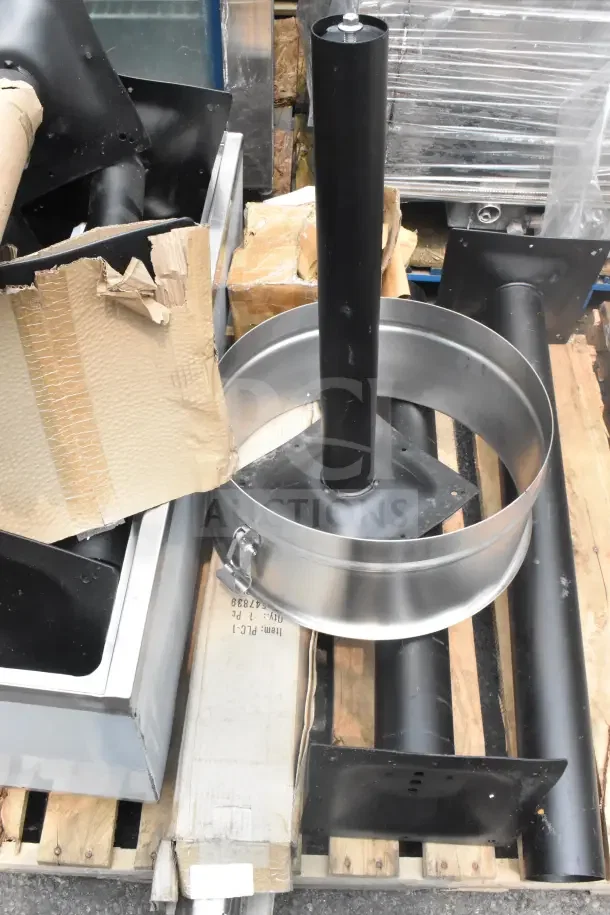 12 brand new scratch and dent items include metal table base pieces and an ice bin, with visible shipping boxes.