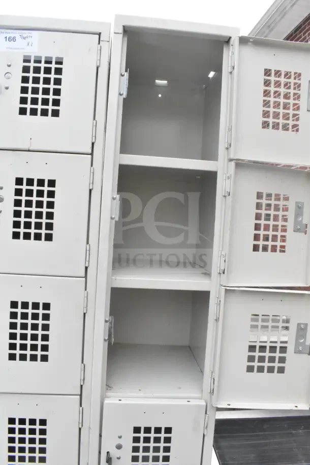 Two tan 6-cubby lockers with vented doors, steel construction, used condition, showing auction tags labeled "166" and "Qty x2".