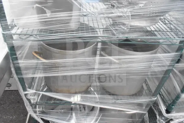 Green 6-tier wire shelving unit on casters, with utensils and colander. Wrapped for shipping; buyer must dismantle.