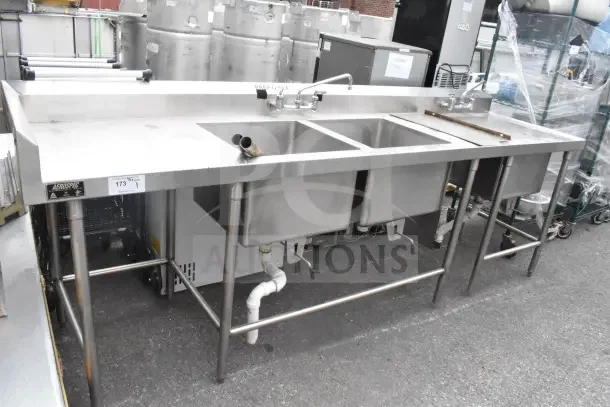 Commercial 2 bay stainless steel sink with extra right side sink bay; includes faucet and drain fittings, Aerospec label visible.