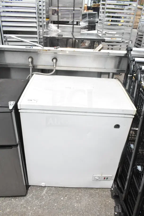 Igloo FRF520-SM chest freezer, 115 volts, 1 phase. White exterior, good condition, visible control panel.