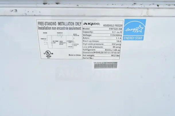 Igloo FRF520-SM Chest Freezer label showing 5.1 cu.ft capacity, 115V, Energy Star rating, and refrigerant details.