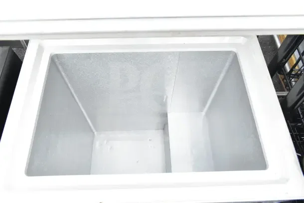 Igloo FRF520-SM Chest Freezer, 115V, 1 Phase, spacious interior, like-new condition, ideal for bulk storage.