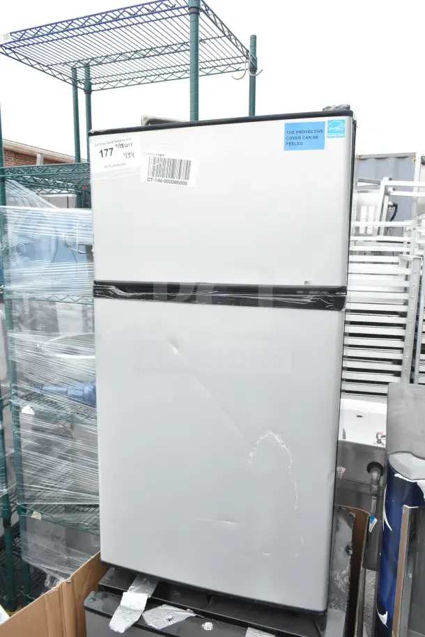 Four mini coolers, including Galanz and LG, 115 volts, 1 phase. Slight cosmetic wear, as shown by protective cover and labels.