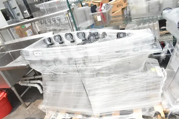 Brand new Regency supermarket shopping carts, 6.3 Cu. Ft., wrapped in plastic. Scratch and dent condition. 5 available.