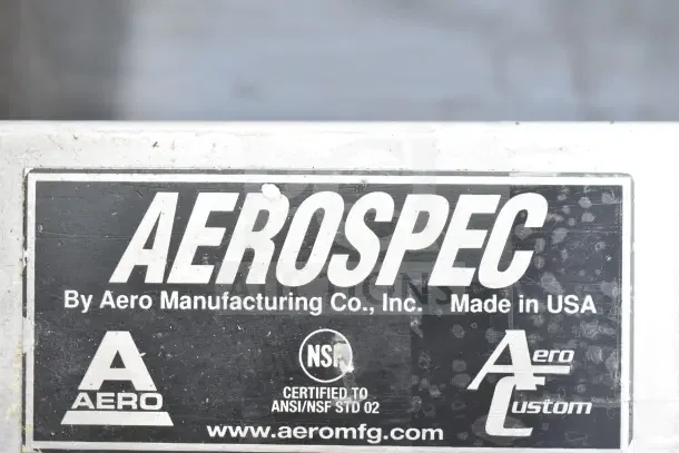 Label on Commercial 3 Bay Sink by Aero Manufacturing, Aeromfg.com, NSF certified, made in USA.
