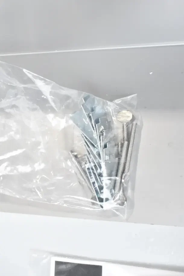 Bag of installation hardware for Vollrath FC-4CP-02120-R cold food well, new condition, includes screws and brackets.