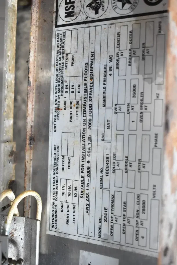 Southbend S241E range label detailing installation, gas type, serial number, and model. NSF certification visible.