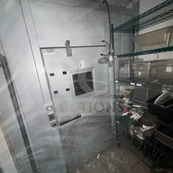 8'x12' Walk In Box w/ Evaporator Fan. Information Provided By The Consignor But Not Verified By PCI Auctions. Picture of the Unit Before Removal Is Included In the Listing; Does Not Include Contents/Shelving In Pictures